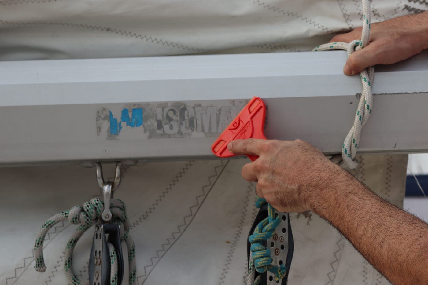 Scraperite Scraping Marine Surface With Red Scraper